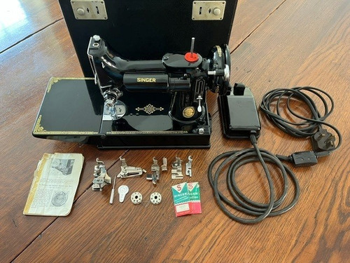Singer sewing machine - singer,